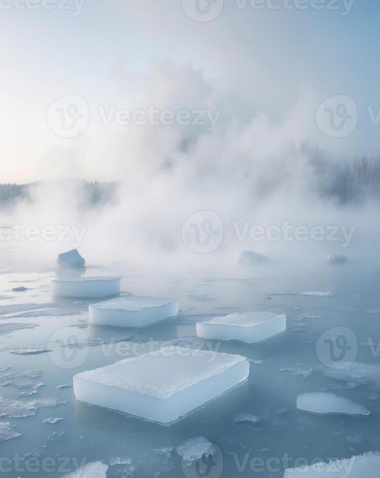 Ice cubes floating in the water with steam rising photo