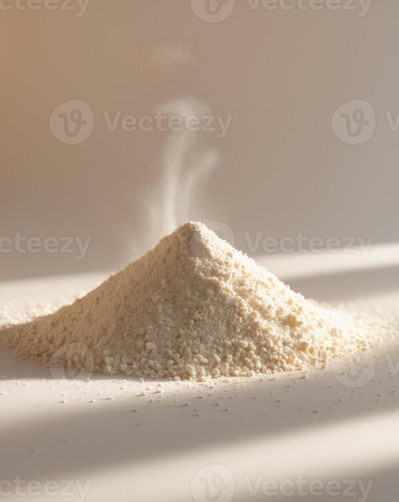 A pile of white powder on a white surface photo