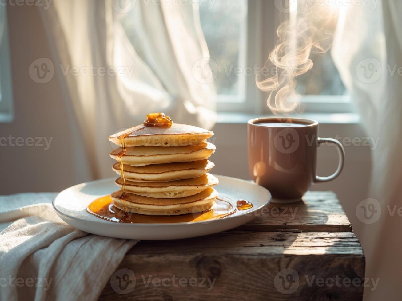 Stack of pancakes with syrup and coffee on a wooden table photo