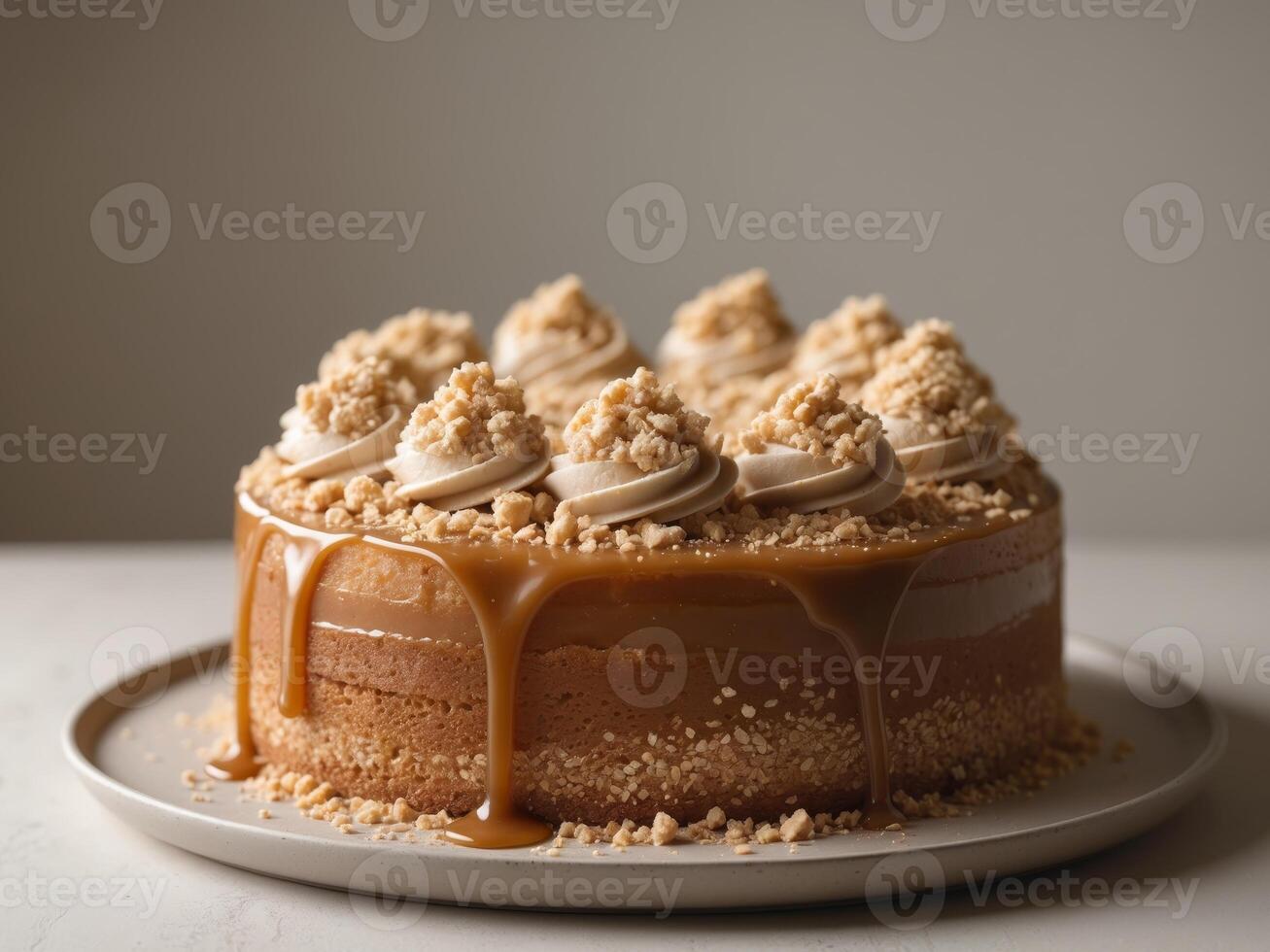 A cake with caramel sauce and crumb topping photo