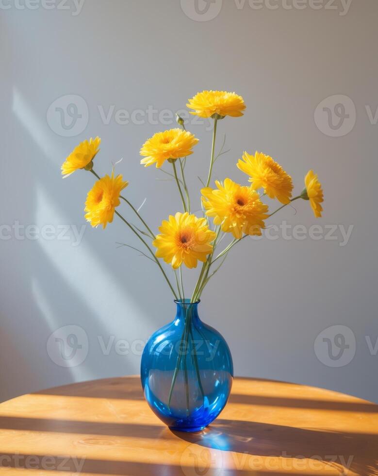 A vase with yellow flowers photo
