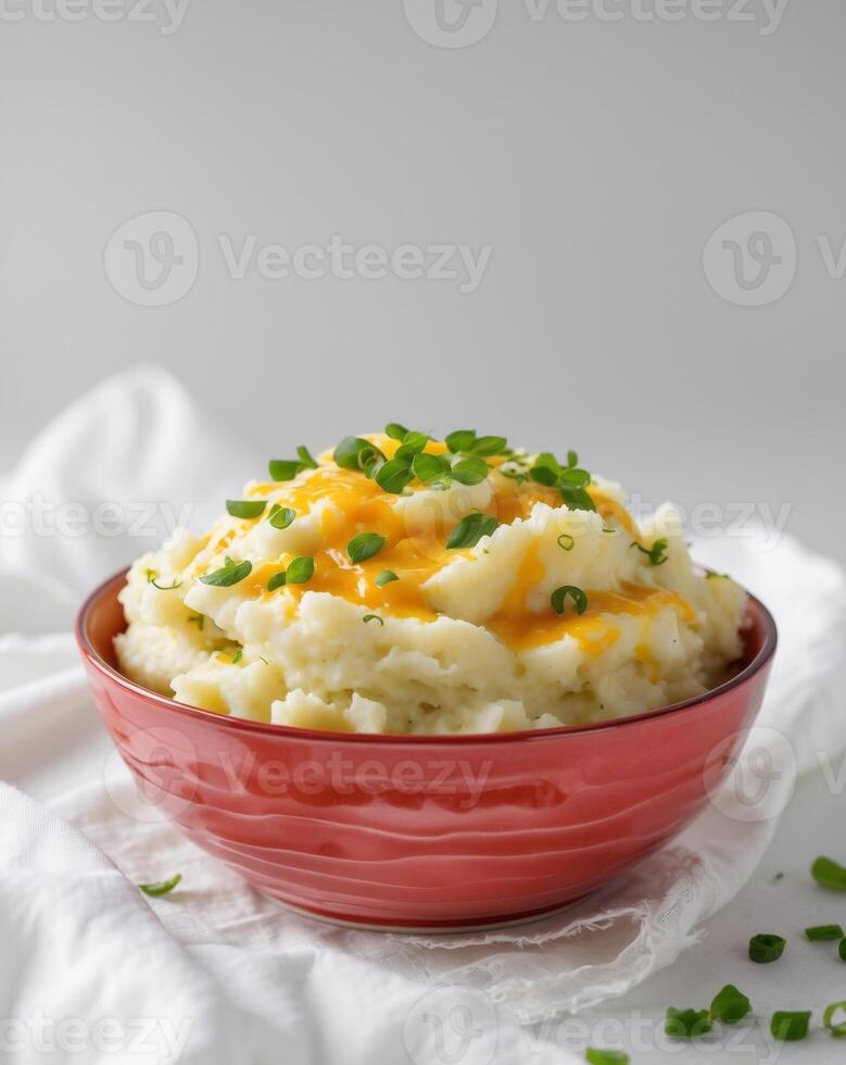 Mashed potatoes with cheese and chives photo