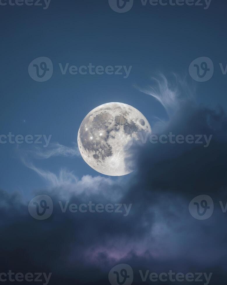the night sky with a beautiful full moon that is cloudy and bright photo