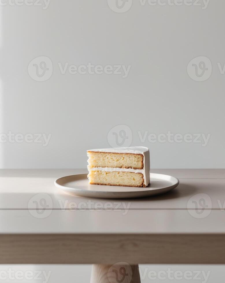 there is a piece of cake on a plate on a table photo