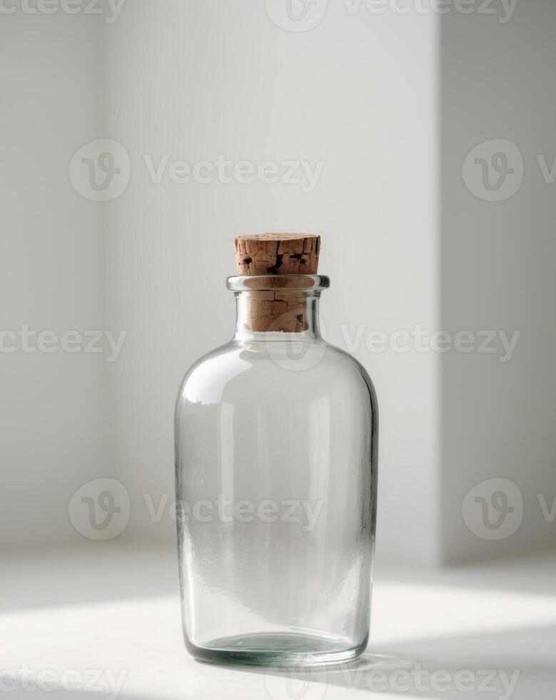 there is a glass bottle with a cork on the top photo