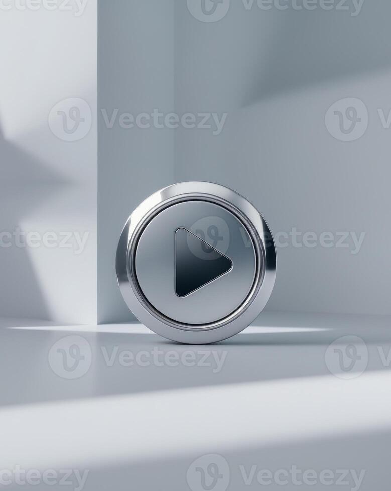 metallic play button showing beginning on gray background photo