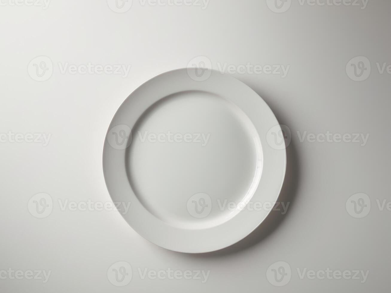 Empty white plate on a table photo