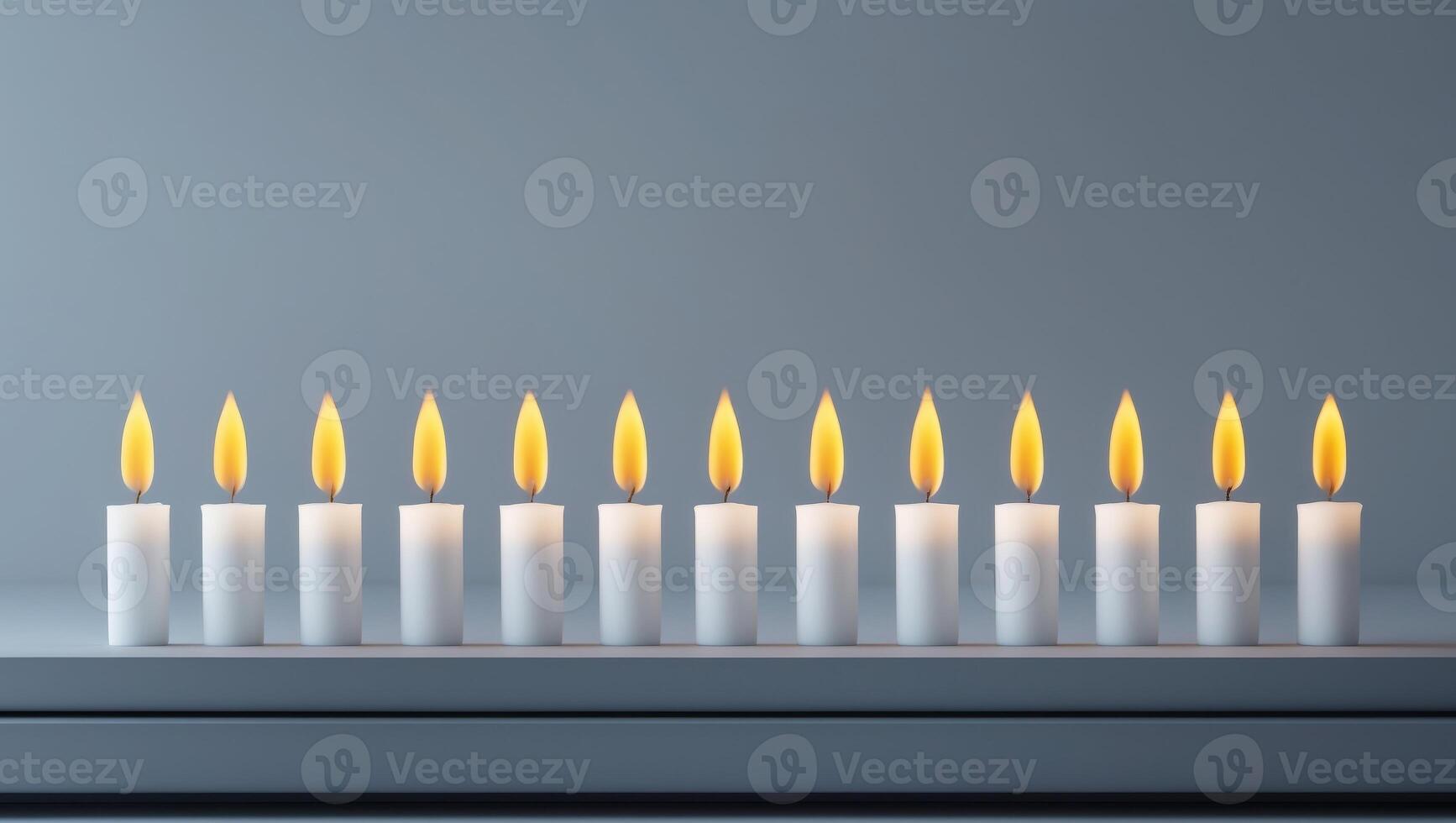 A row of white candles on a table photo