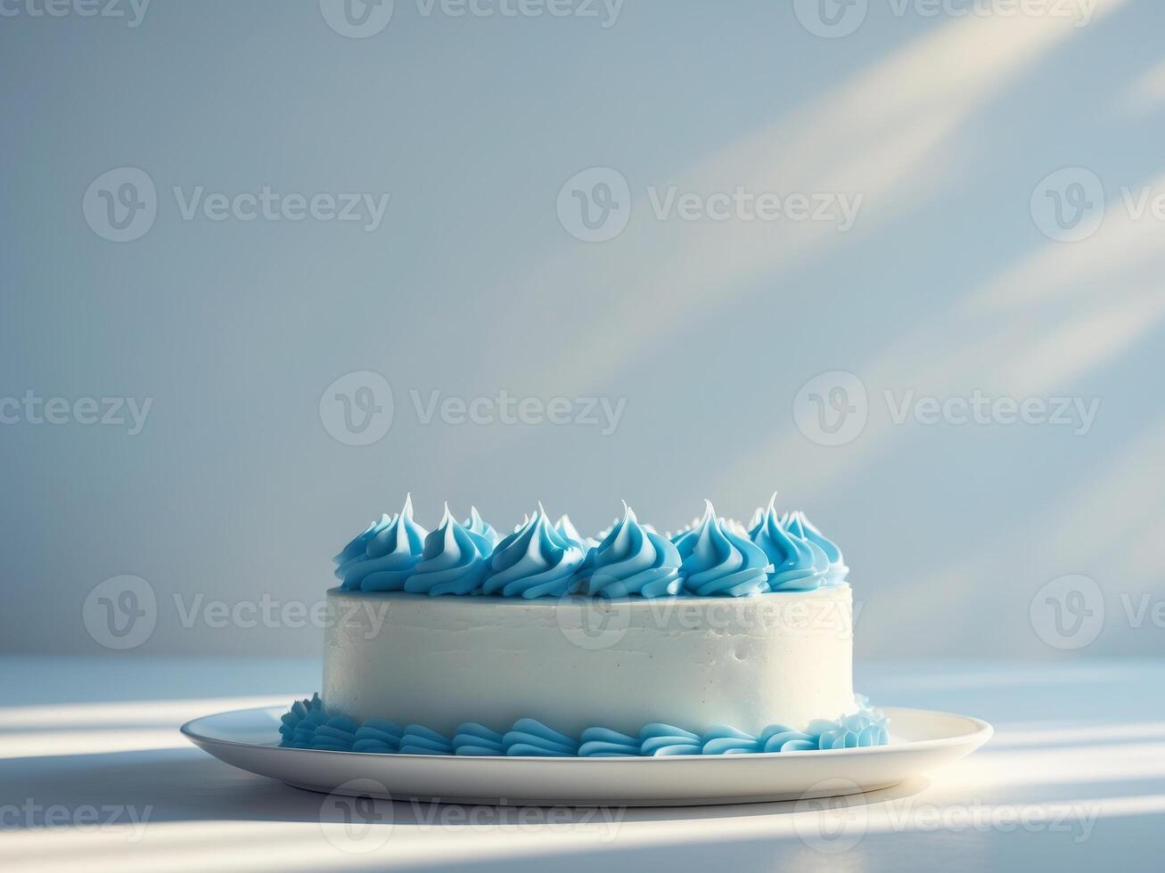 A blue and white cake on a white plate photo