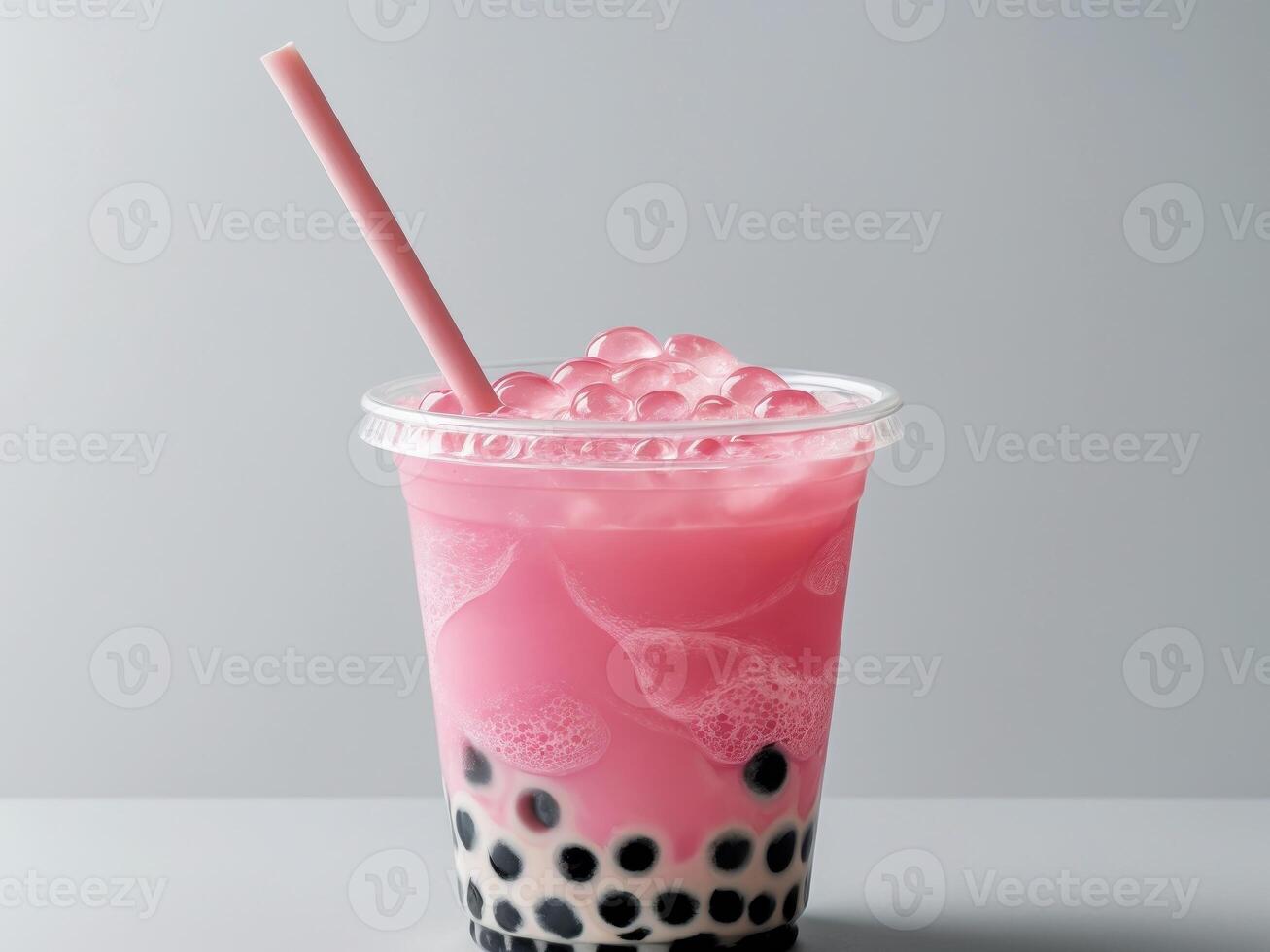 Pink Bubble Tea in Plastic Cup with Straw photo