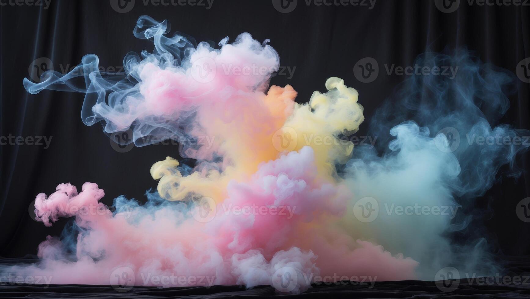 Colorful smoke on black background photo