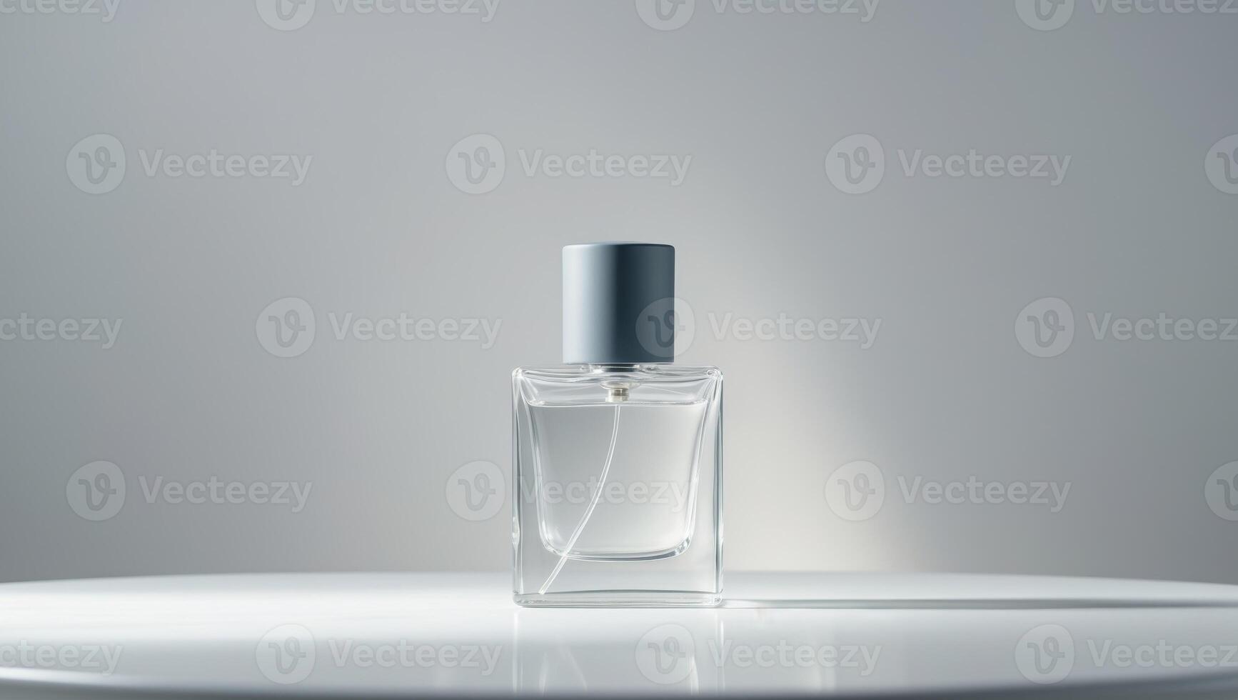 A bottle of perfume sitting on a table photo
