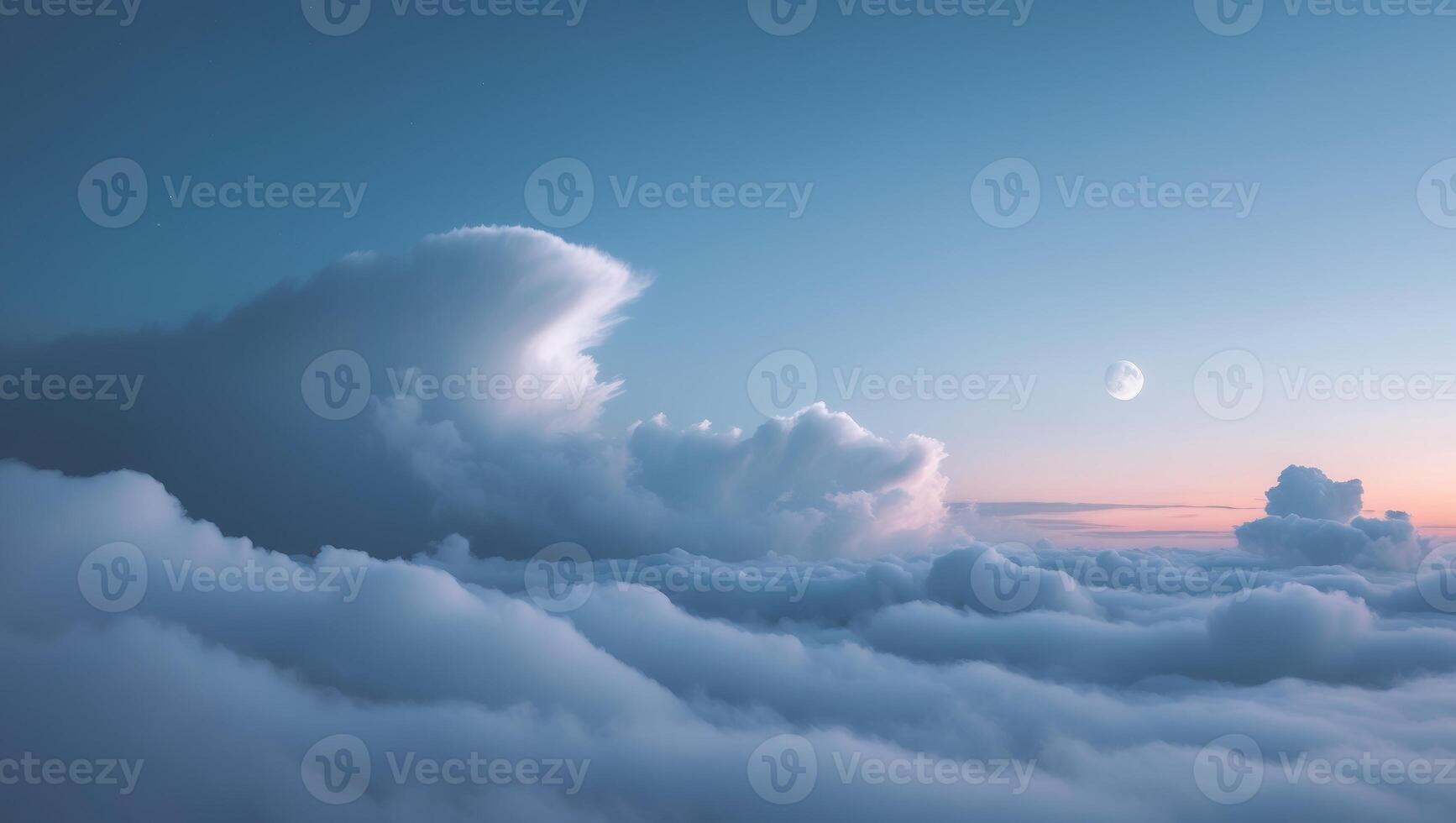 A view of the clouds and the moon over the ocean photo