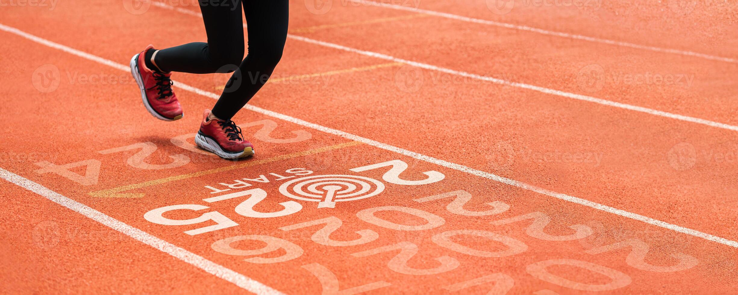 New year 2025 concept, beginning of success. Text 2025 written on asphalt road and male runner preparing for the new year. Concept of challenge or career path and change. photo