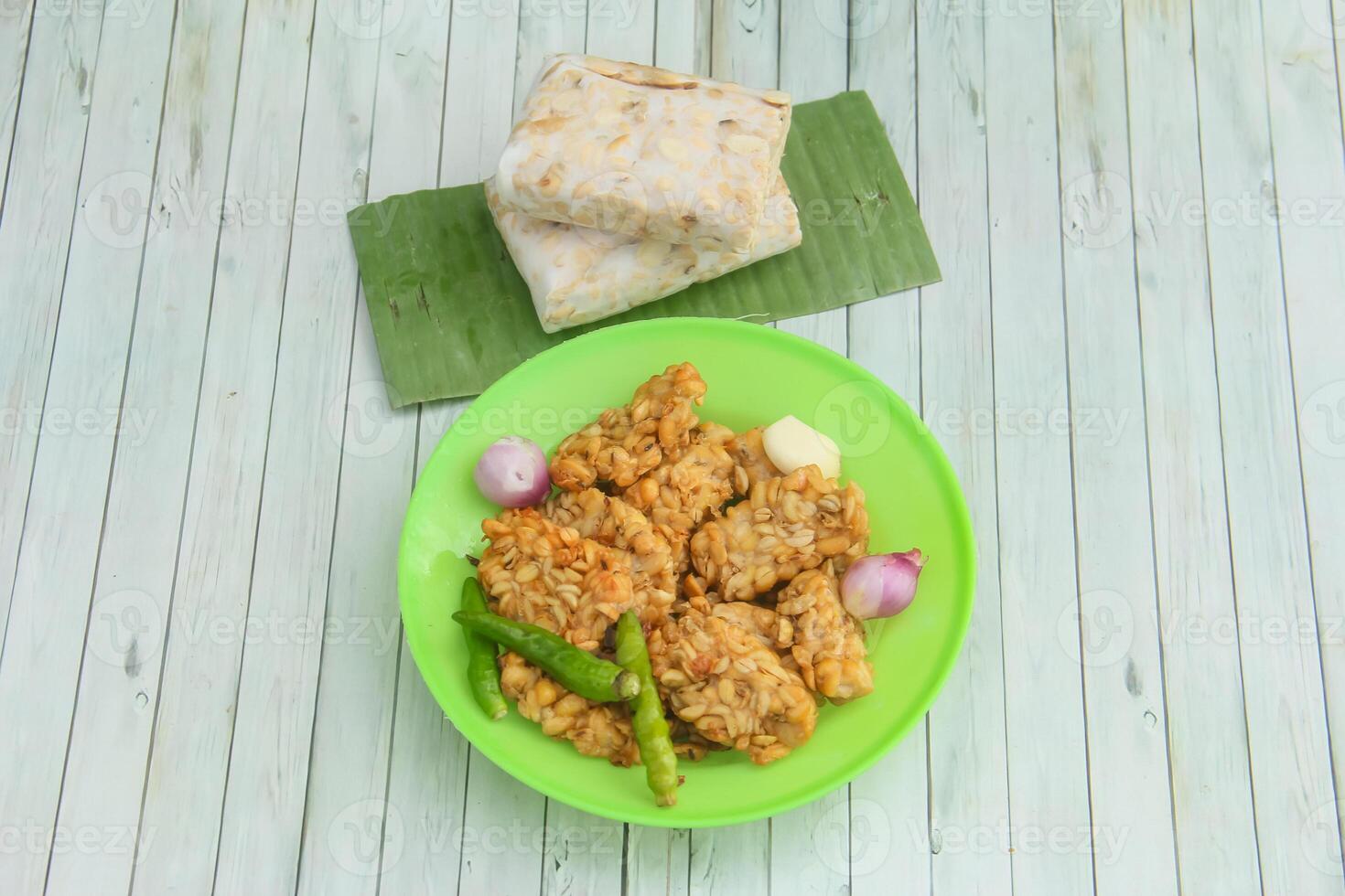 Fried Tempeh, Tempeh is a food made from soybeans and fermented rhizopus fungi, tempeh is a typical Indonesian food, tempeh is a healthy food made from soybeans photo
