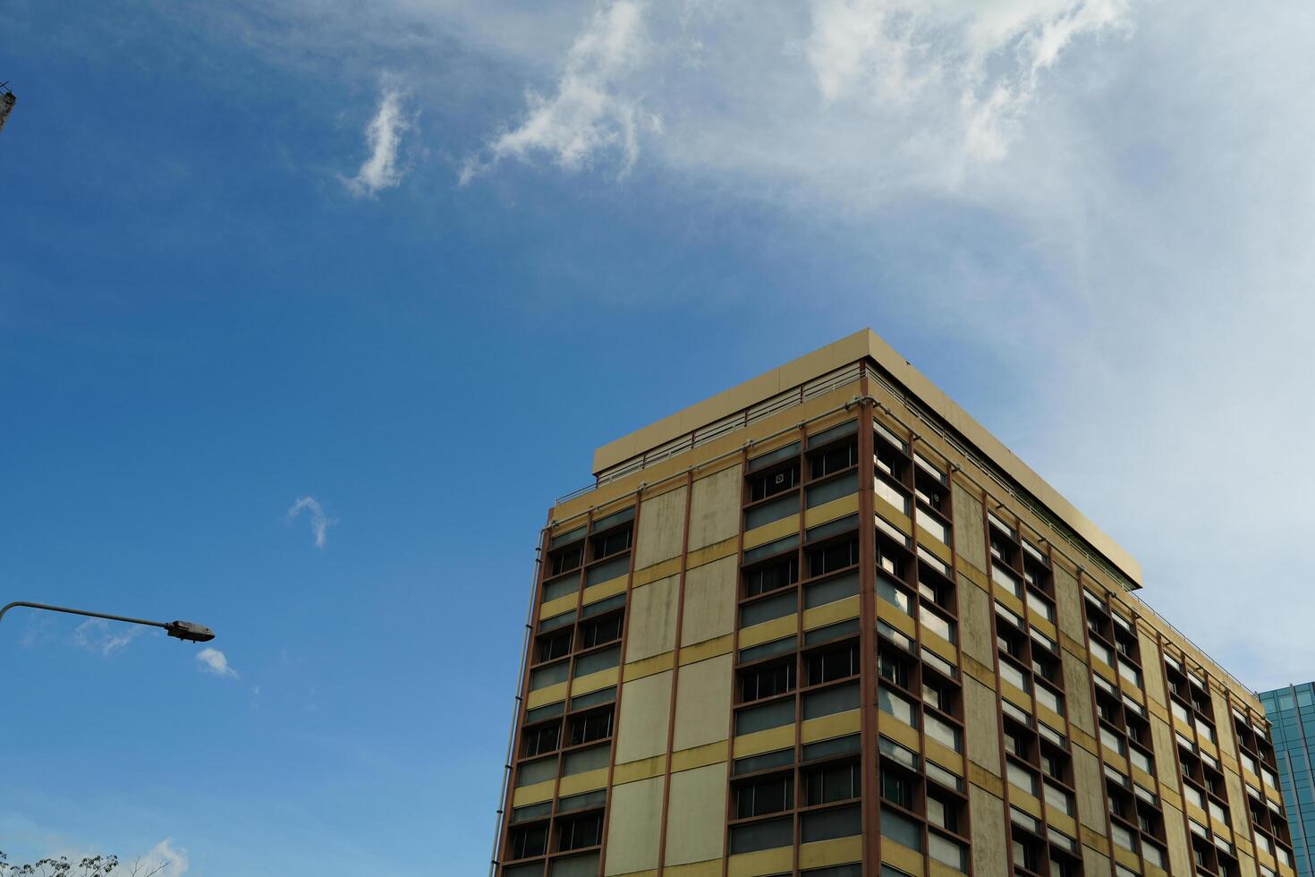 Bangkok, Thailand, 2024 - Apartment Building cityscape, tall buildings for resience, city center beautiful landmarks, modern buildings and tall towers in Bangkok. Thailand. with blue sky background photo