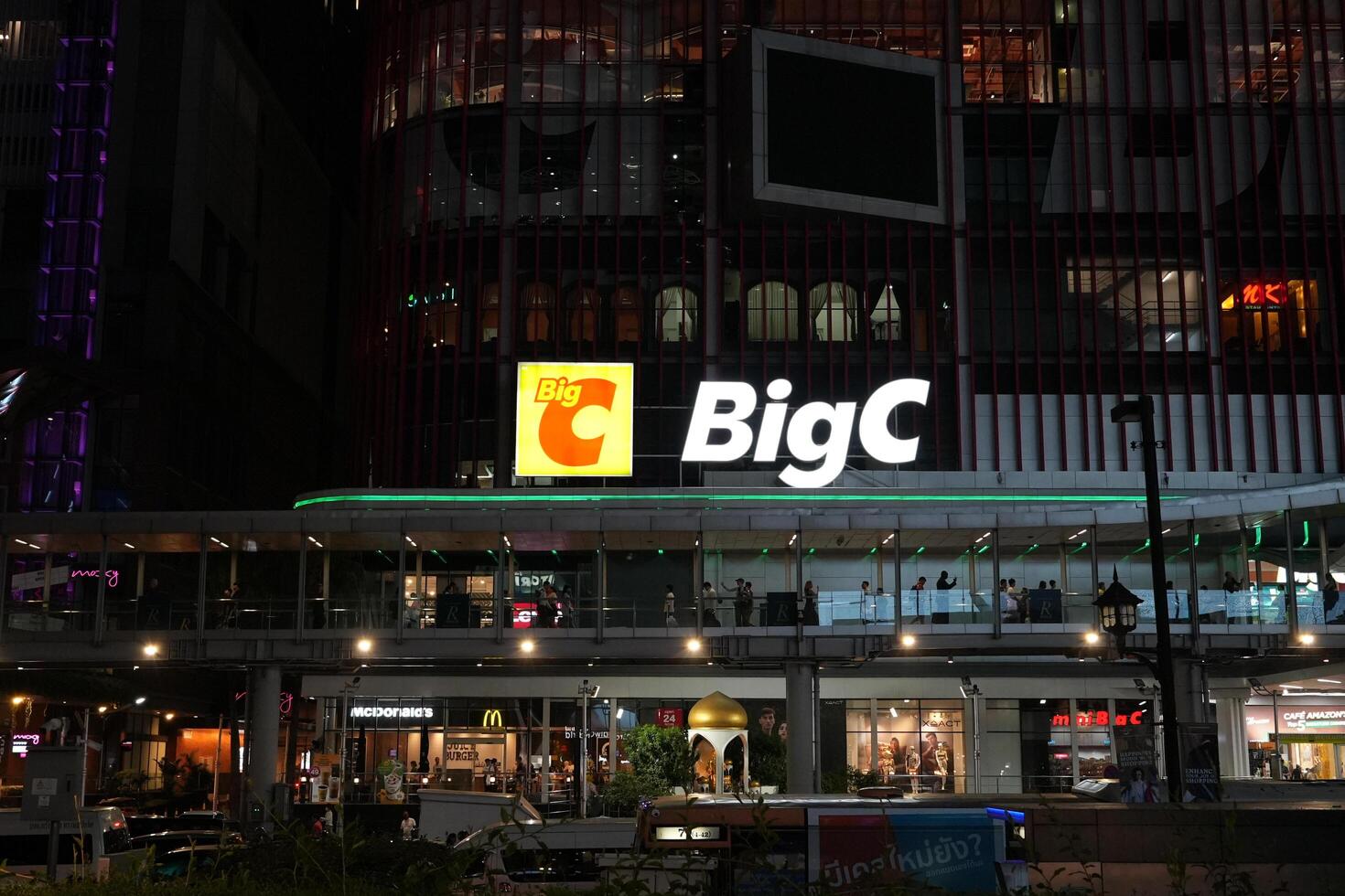Bangkok, Thailand, 2024 - Front view at night of Big C Ratchaprasong at Ratchaprasong road opposite Central World photo