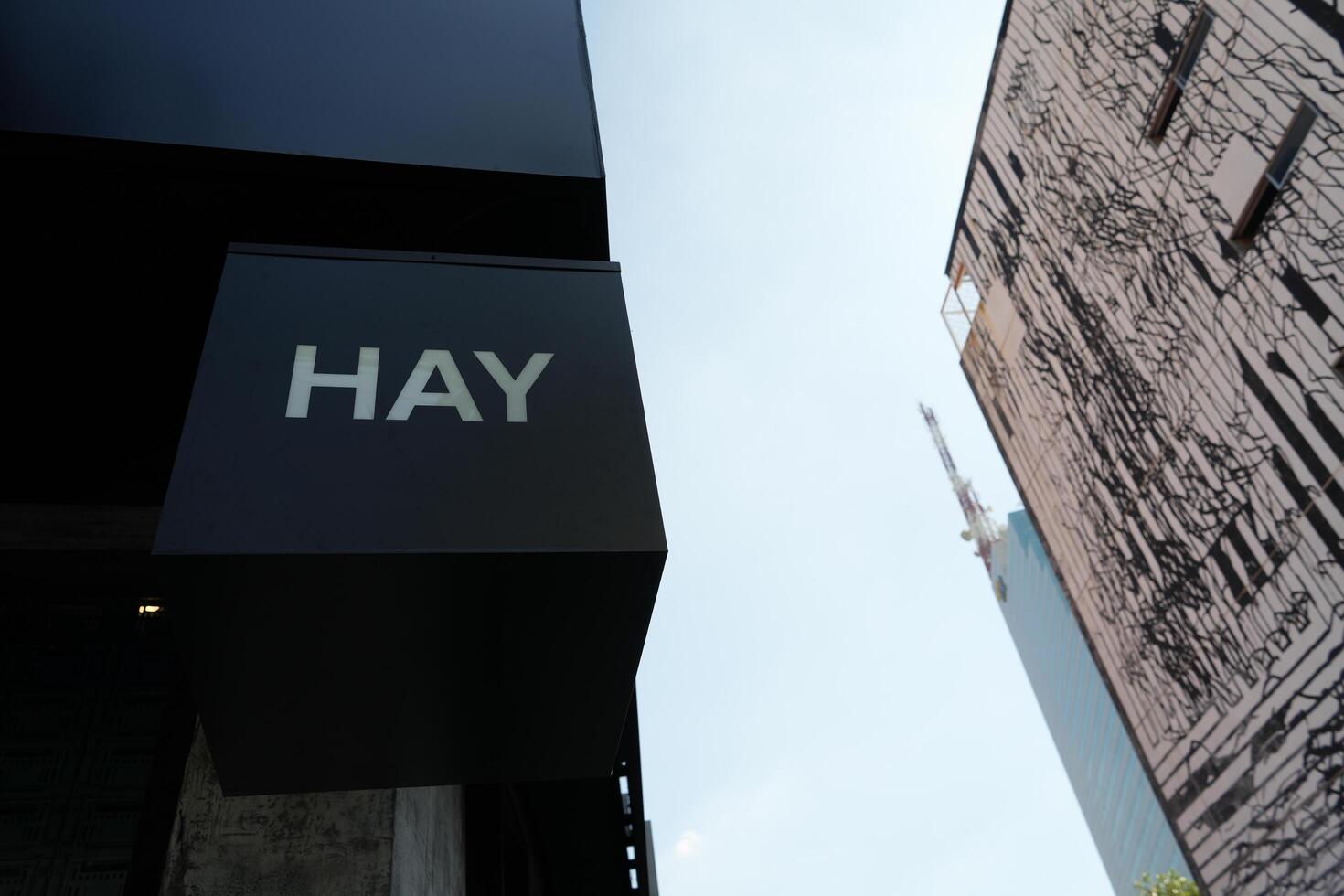 Bangkok, Thailand, 2024 - Hay store sign post in bangkok, HAY is a Danish furniture company founded in Copenhagen, Denmark, in 2002 photo