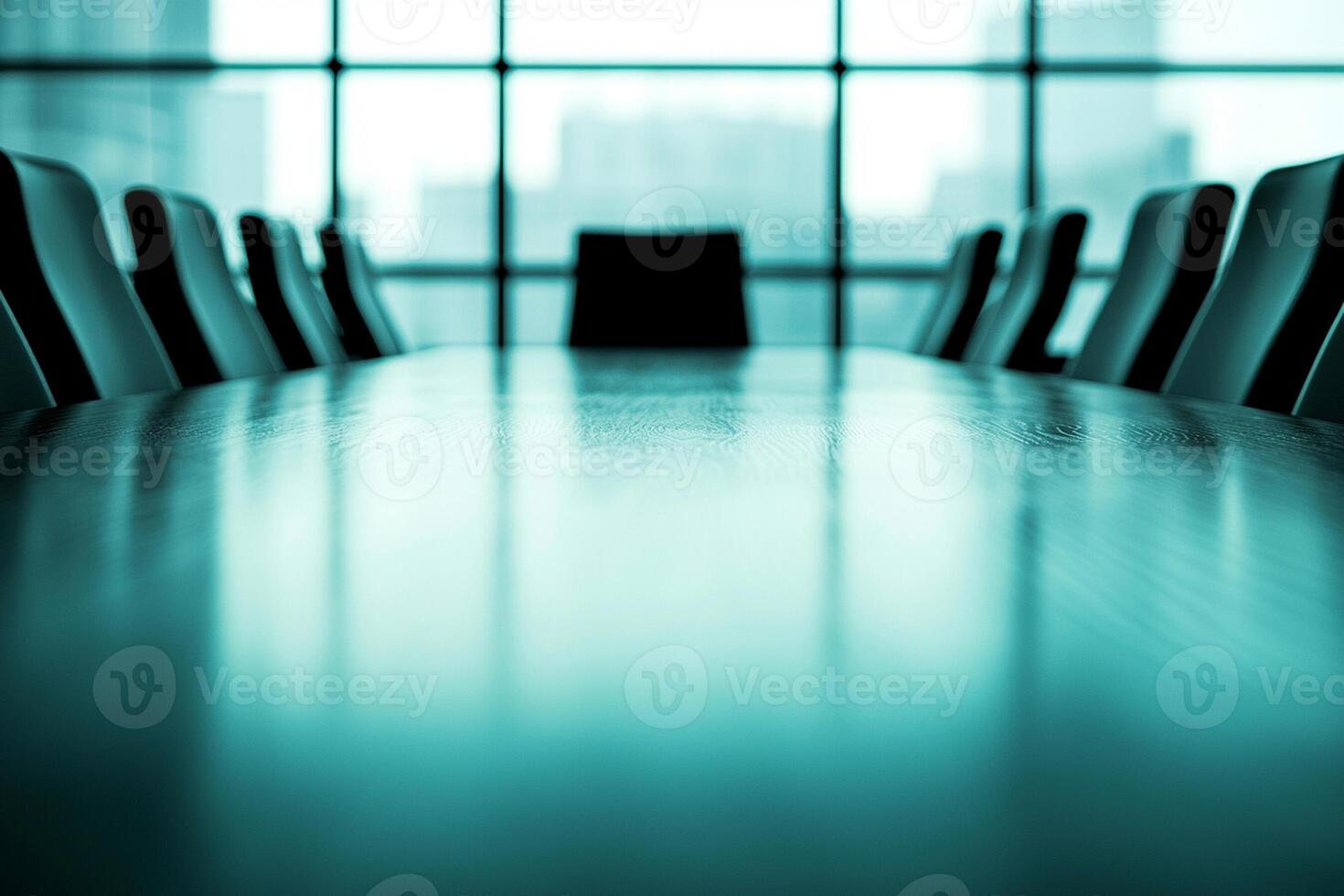 A conference table is shown in front of a window photo