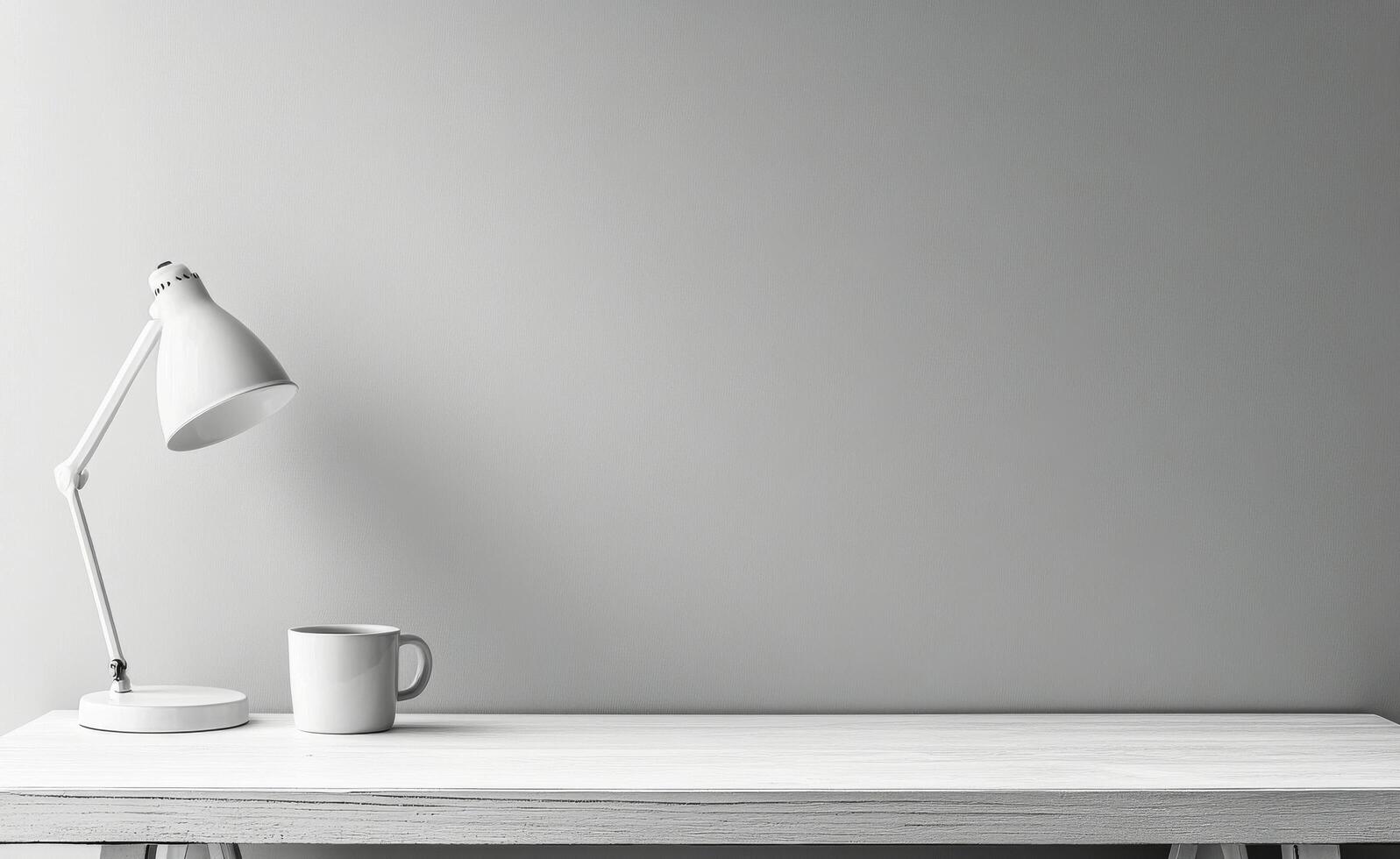 Elegant lamp and white mug on a wooden table against a soft gray wall photo