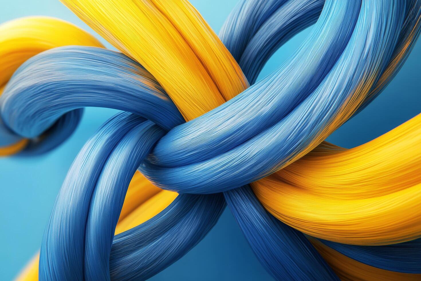 Vibrant blue and yellow twisted fibers create a mesmerizing abstract pattern in close-up view photo