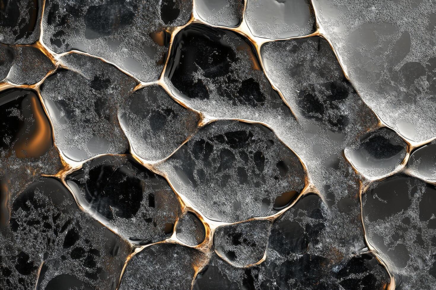 Water droplets reflecting light on a textured surface creating an abstract design in a close-up view photo