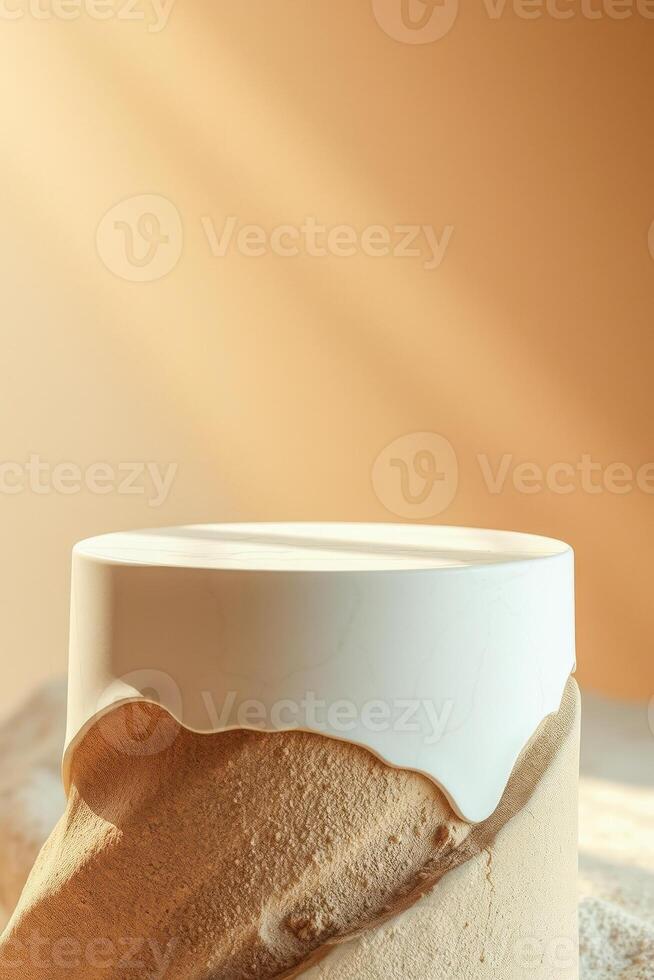 circular white display platform on textured brown base photo