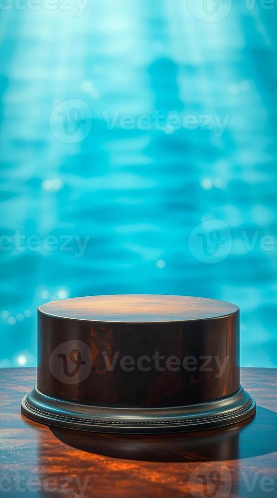 dark brown cylindrical pedestal on wood surface photo