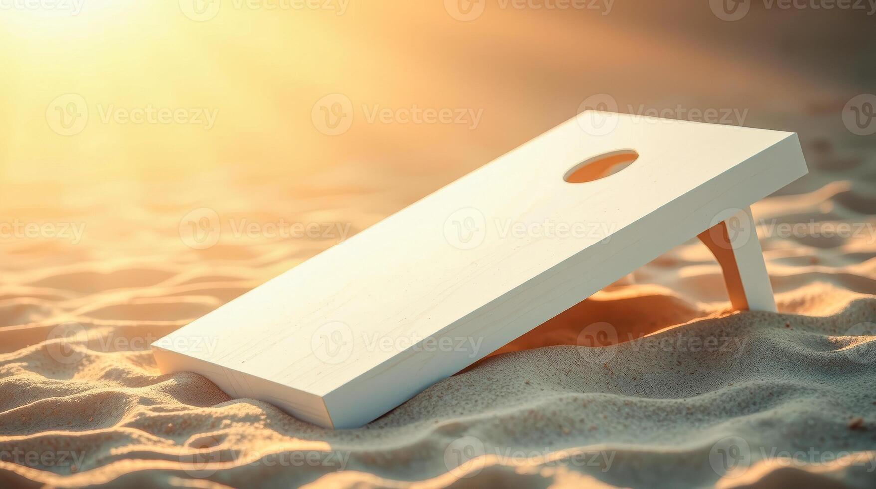white wooden game board on sandy beach at sunset photo