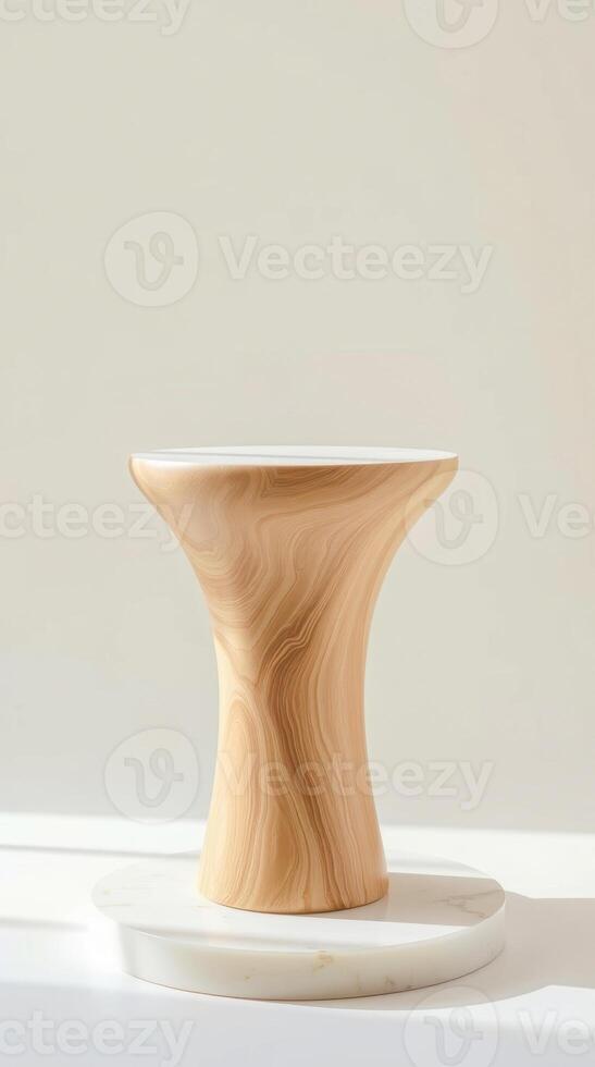 round wooden pedestal with marble base photo