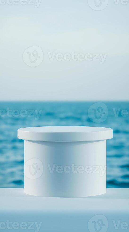 white cylindrical platform by the ocean photo