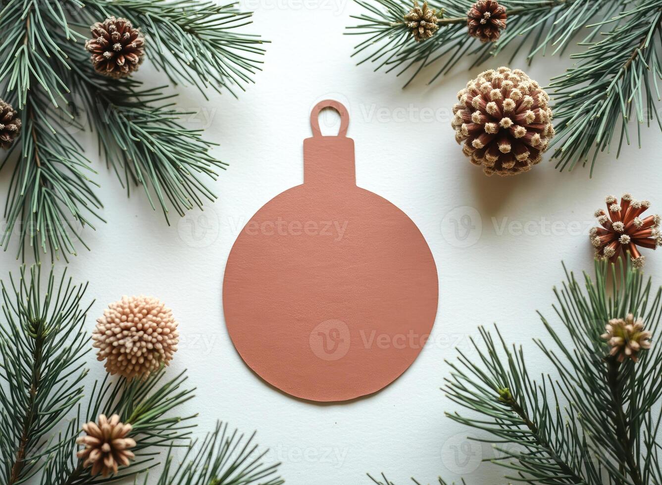 terracotta circle ornament with pine branches pinecones photo
