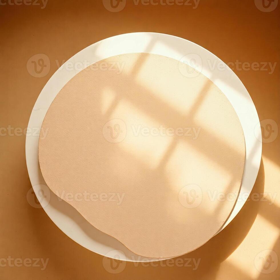 beige circle on white circle with shadows photo