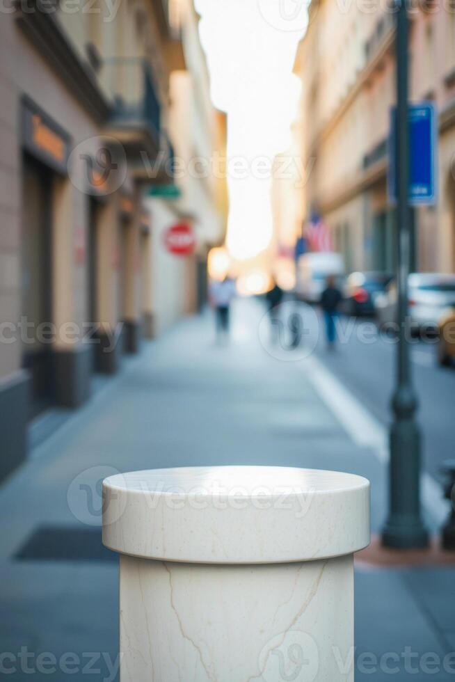 stone column on city sidewalk photo