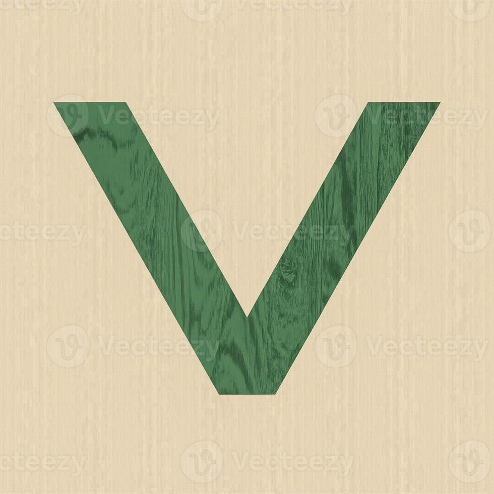inverted v-shape with wood-textured green triangles on a beige background photo