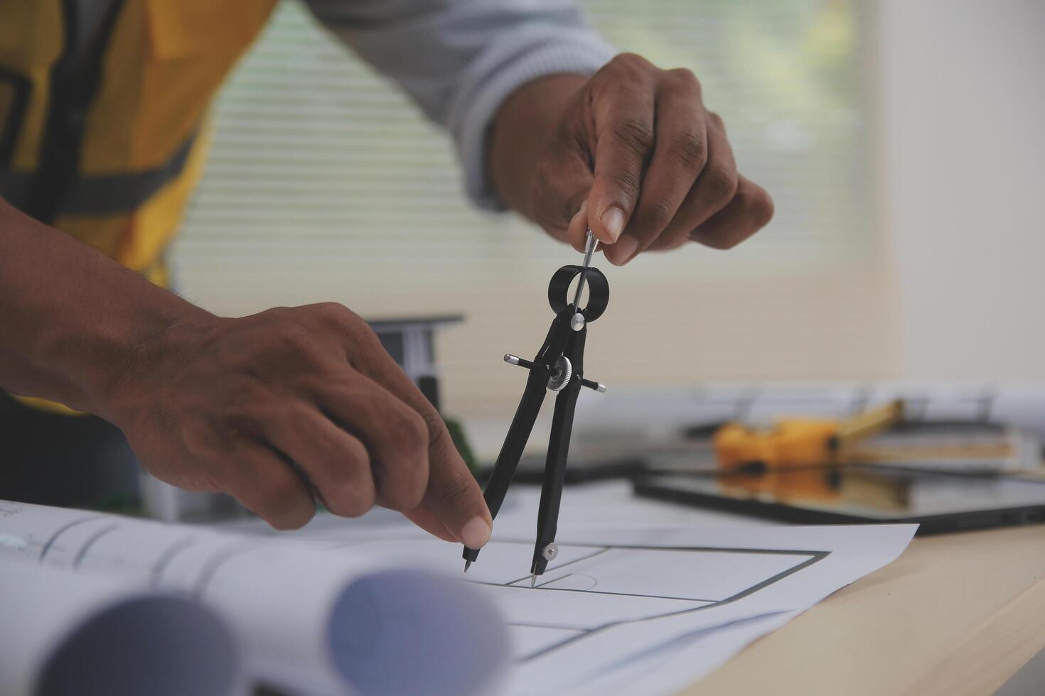 Image of engineer meeting for architectural project. working with partner and engineering tools on workplace vintage tone. photo