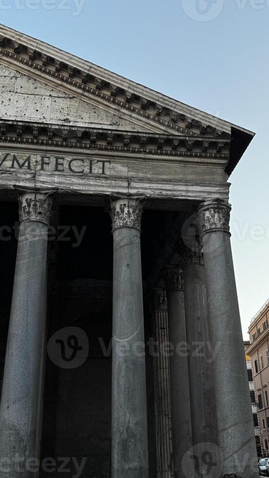 Historical architecture of the Pantheon in Rome at twilight showcasing iconic columns and classical design elements photo