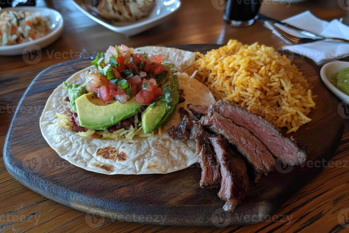 Delicious Mexican Taco with Rice, Steak, and Avocado photo