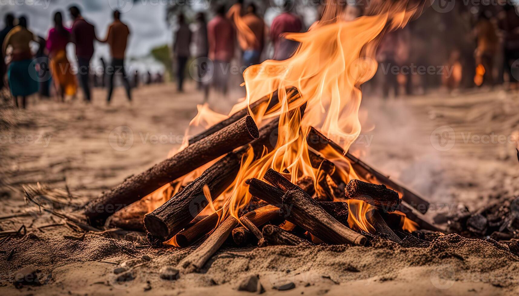 Campfire with Blurred Crowd in the Background photo