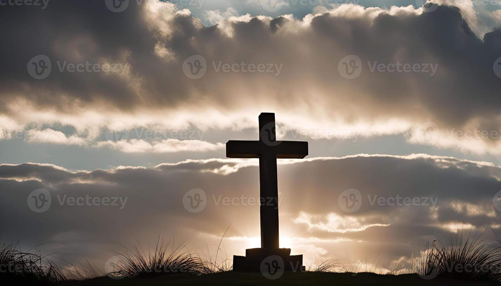 Silhouette of a Cross Against a Dramatic Sky photo
