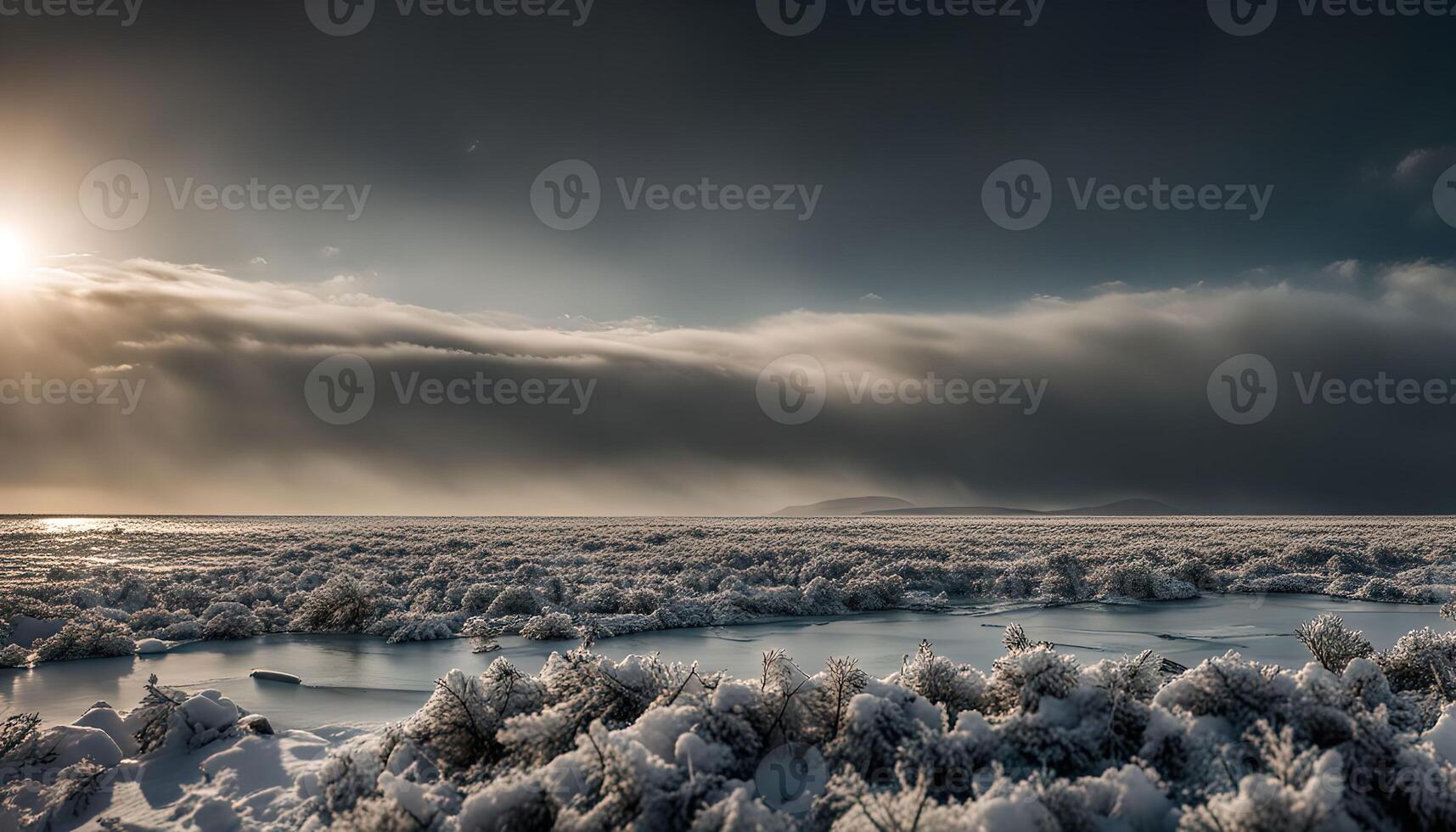 Winter Landscape with Frozen Lake and Dramatic Sky photo