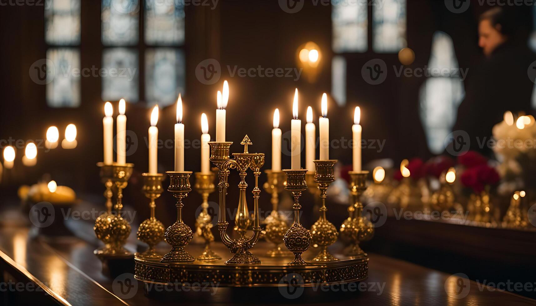 Golden Candle Holders in a Dark Setting photo