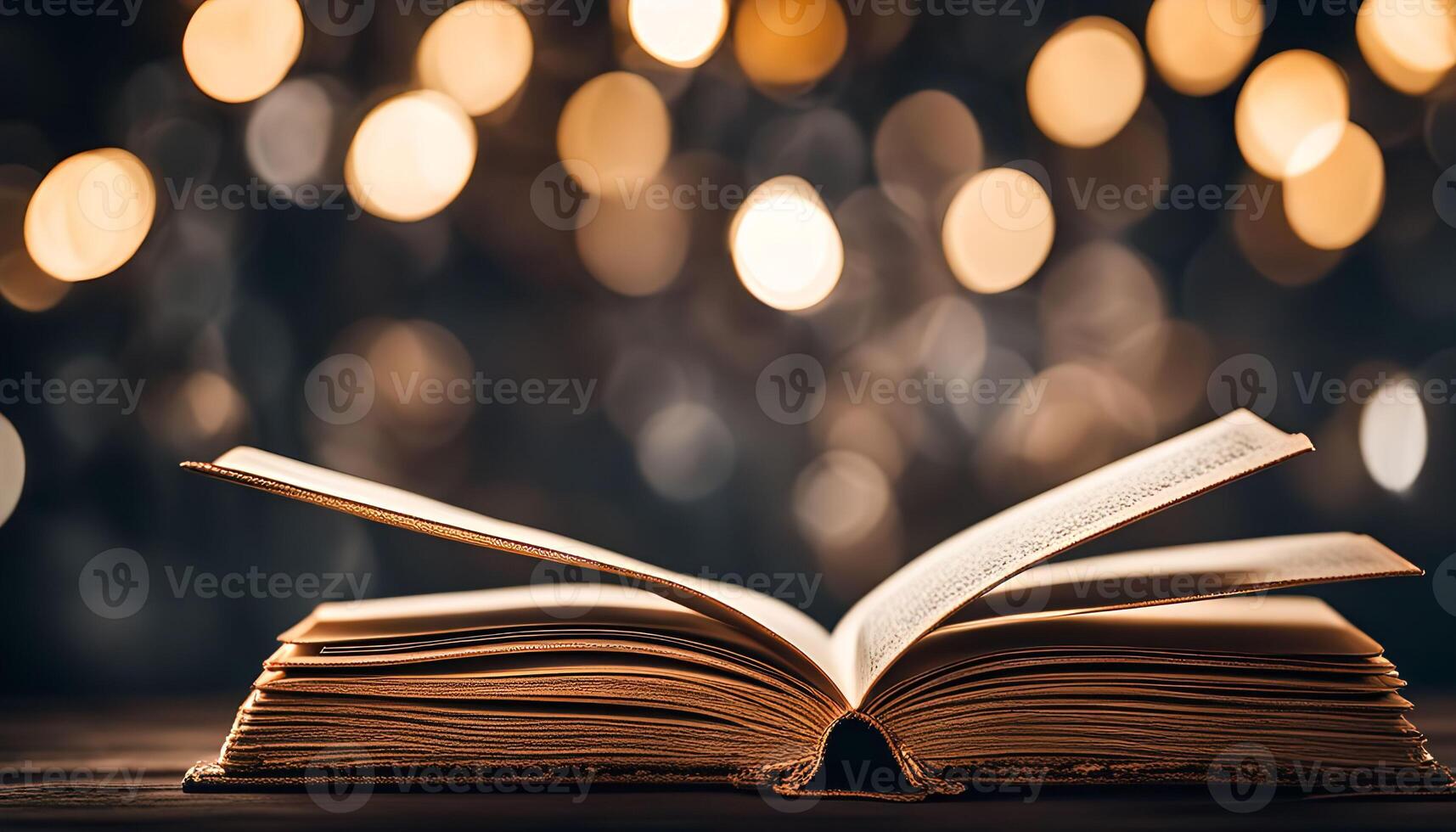 Open Book with Warm Bokeh Lights photo