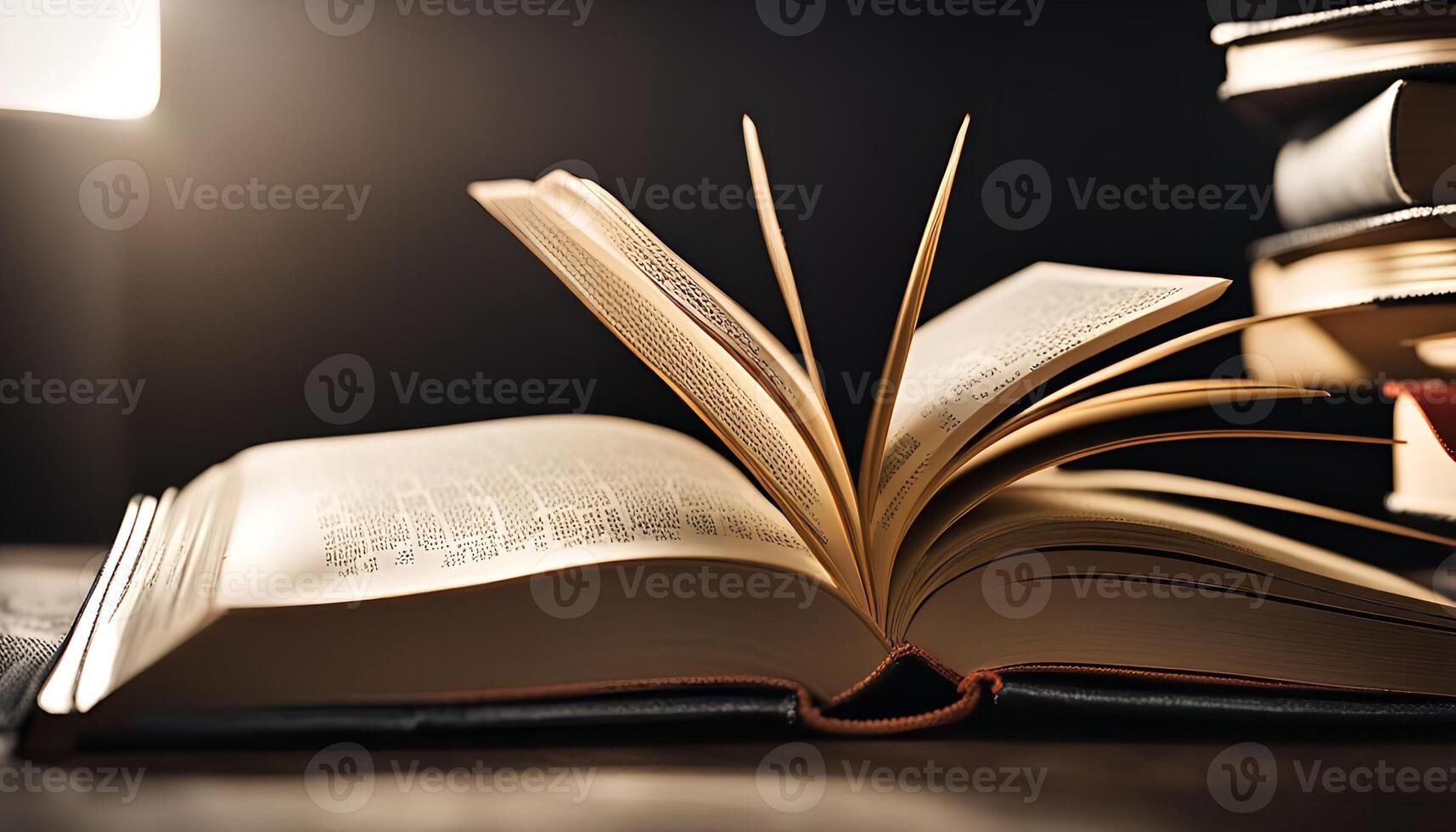 Open Book with Stack of Books in Background photo