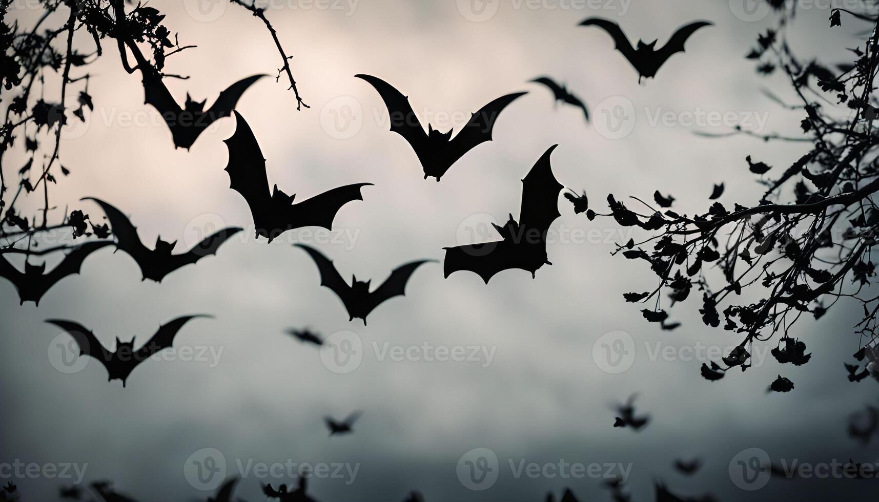 Bats in Flight Against a Twilight Sky photo
