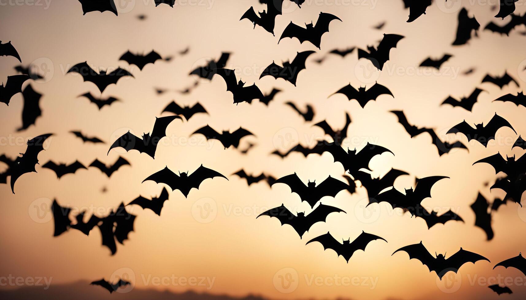Bats in Flight at Sunset photo