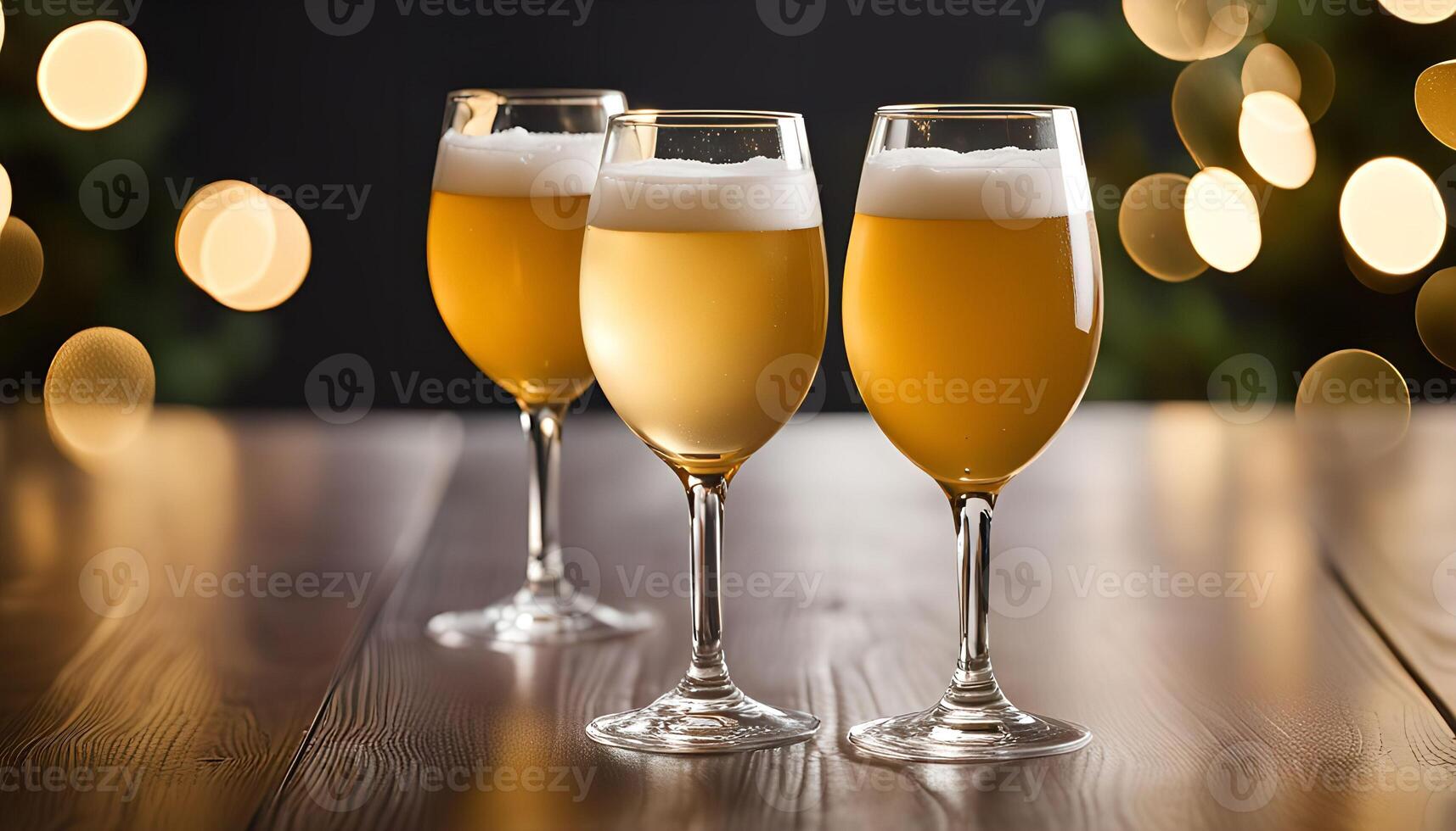 Three Glasses of Beer on a Wooden Table photo