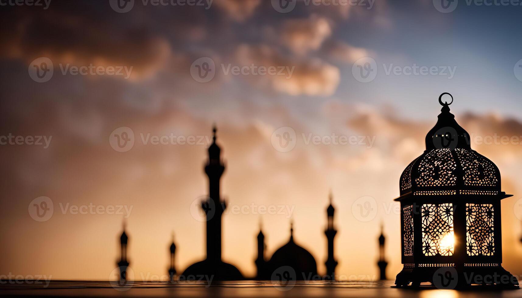 Ramadan Lantern with Mosque Silhouette at Sunset photo