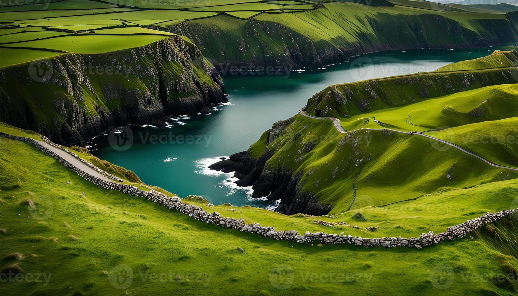 Scenic Coastal Road Winding Through Lush Green Hills photo