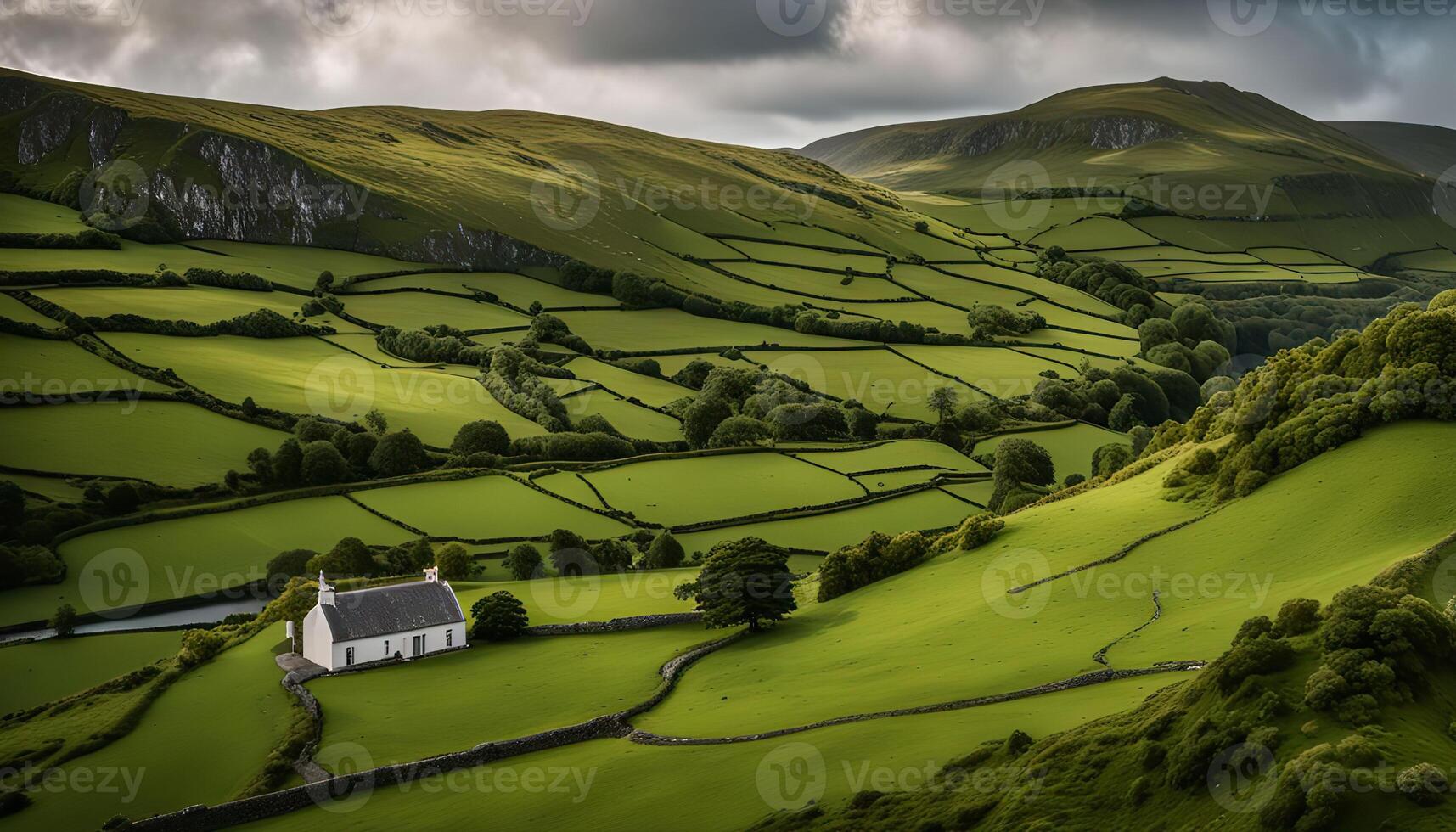 Rolling Green Hills with a Quaint White Cottage photo